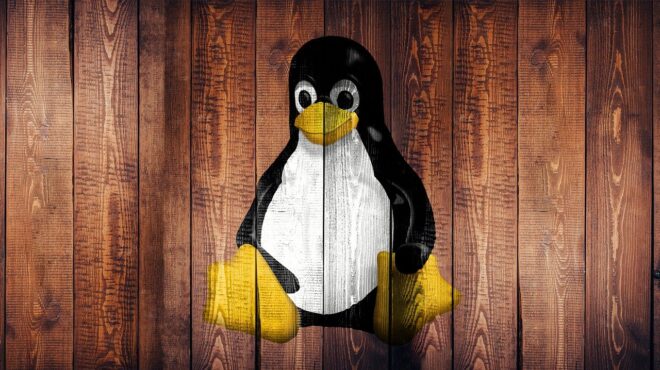 Linux on Wood Background